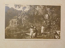 C1633 Postcard RPPC people fishing with large cane poles on the Sugar River