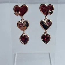 KIRKS FOLLY Triple Red Crystal Heart Dangle Goldtone Earrings