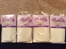 4 pairs Girls fashion tights. Size 12-14. Ivory