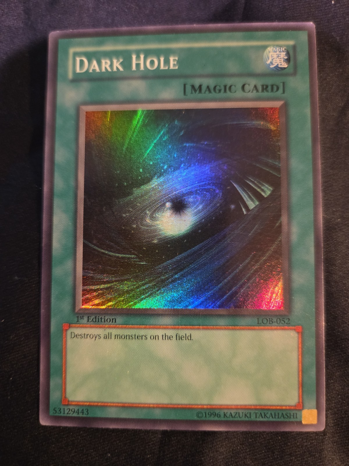 Dark Hole LOB-052 (YuGiOh Legend of Blue Eyes White Dragon) — is it worth grading?