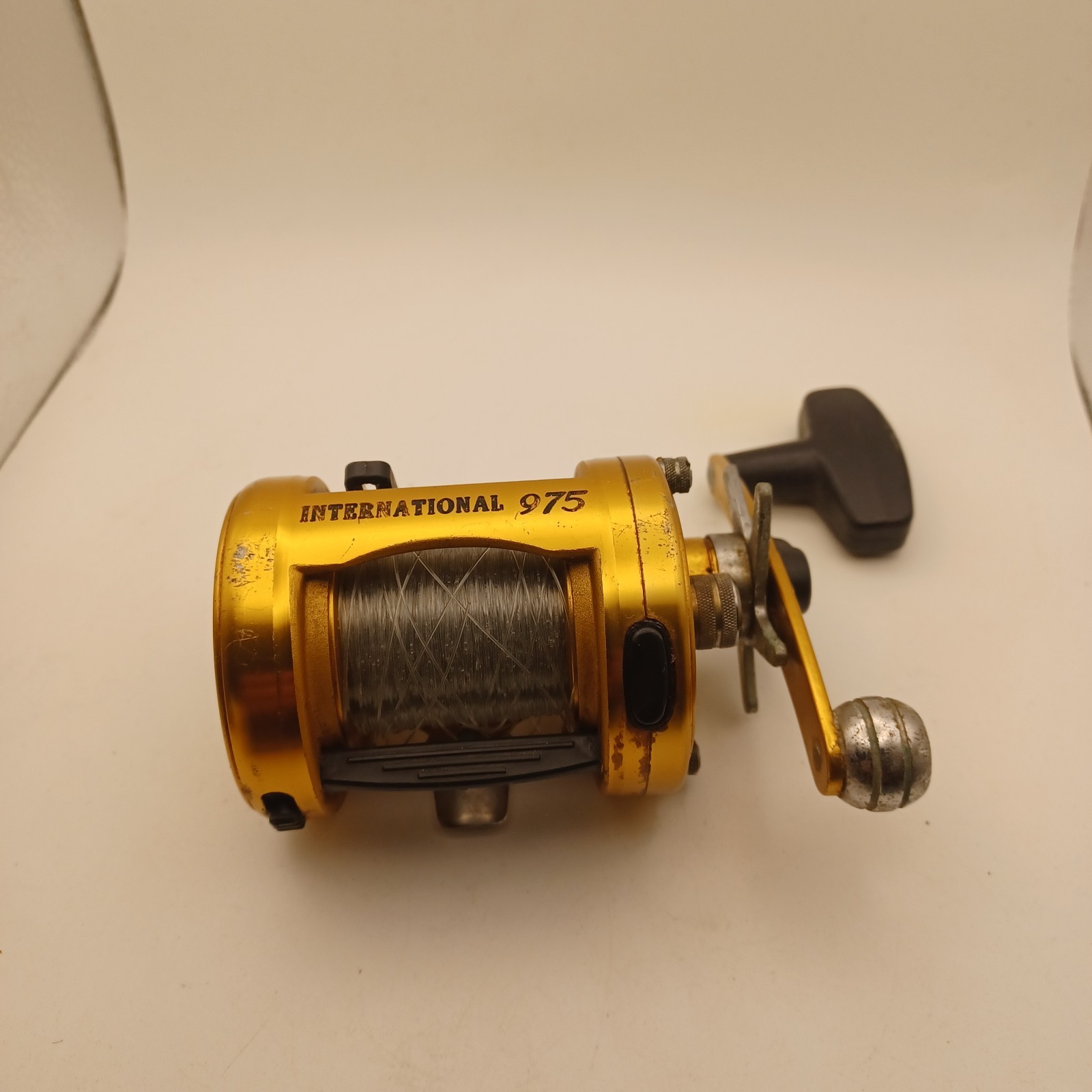 Penn International 975 Gold Reel Made in USA Good  Shape . 