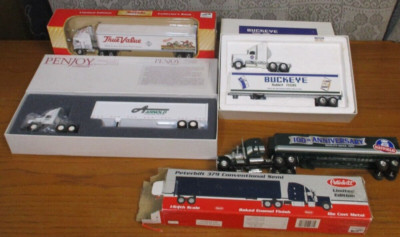 Lot of 4 Semi Tractor Trailers - True Value, Peterbilt, Arnold, Buckeye w Boxes