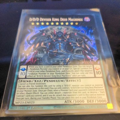 D/D/D Deviser King Deus Machinex MP23-EN023 25th Anniversary Tin: Dueling Heroes