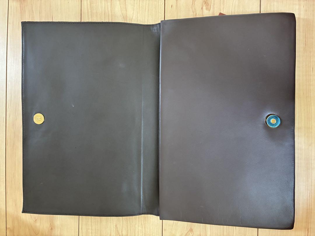 Pochette Yves Saint Laurent in pelle marrone nero beige lusso classica elegante