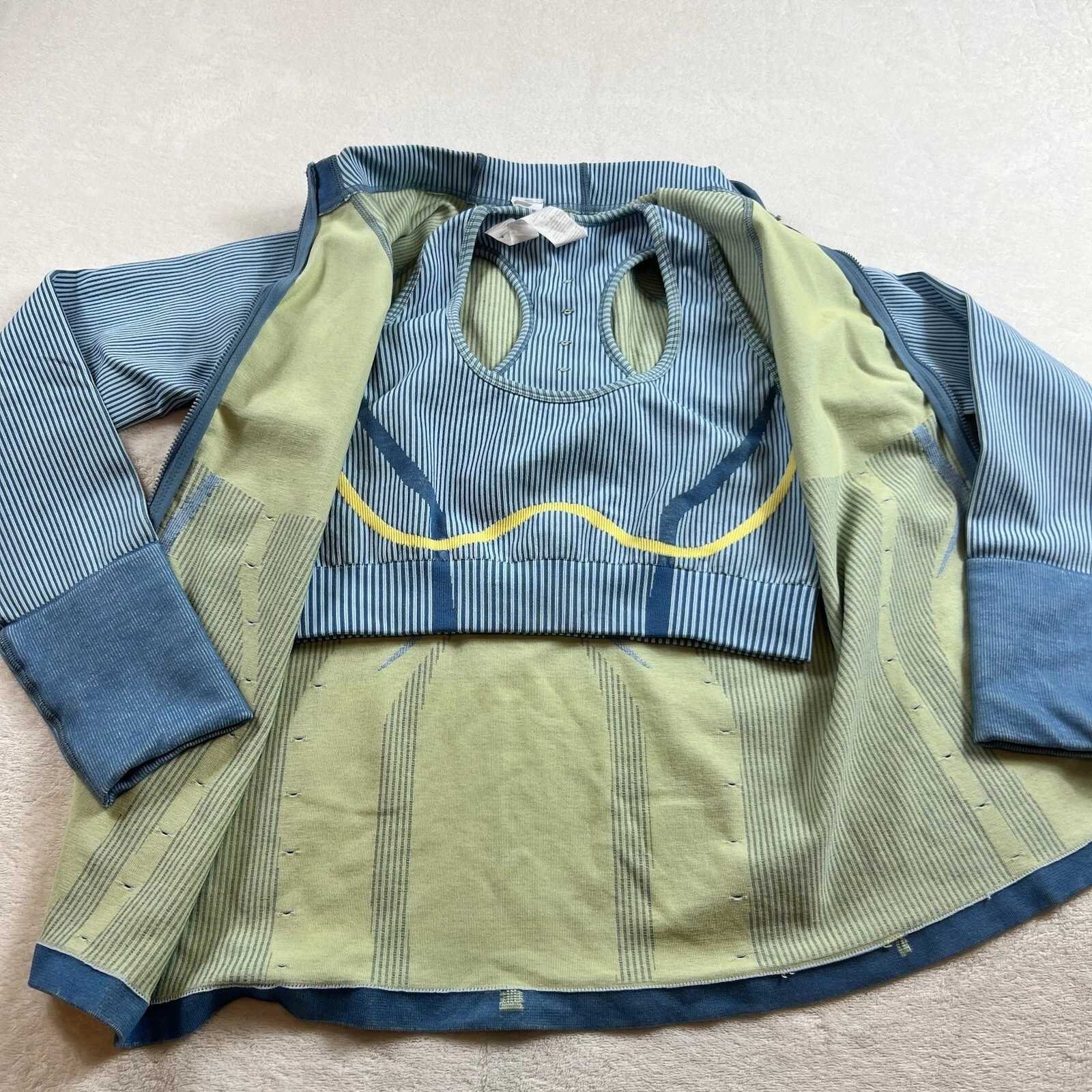 fabletics seamless fitted zippered sculpknit sports bra jacket