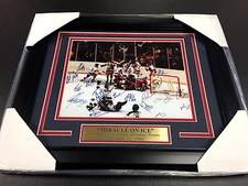 AUTOGRAPHED REPRINT COPY OF 1980 TEAM USA MIRACLE ON ICE FRAMED 8X10 PHOTO  