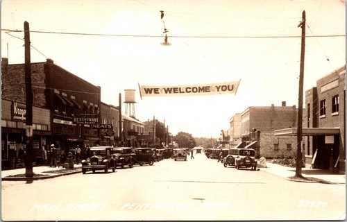 Postcard RPPC Pentwater Michigan Main Street Sign: "We Welcome You" Unposted