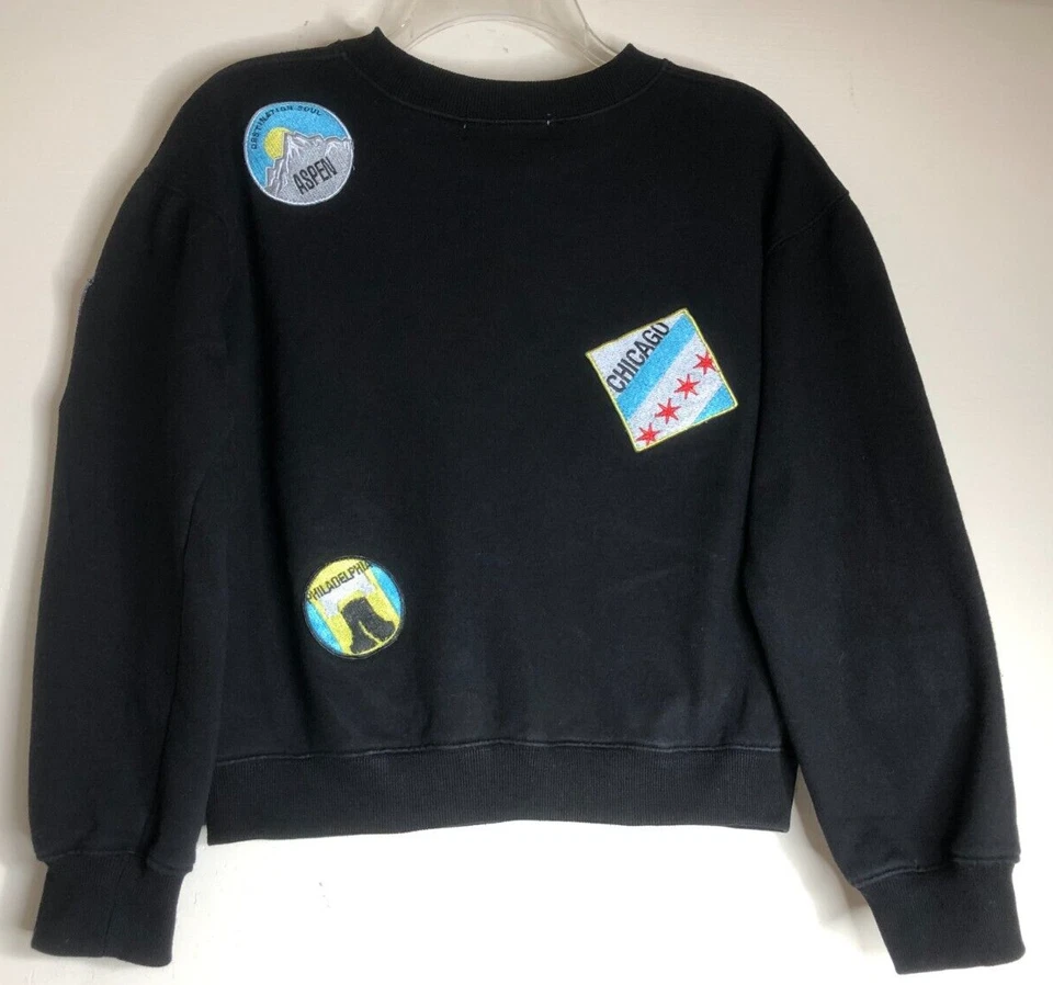 SoulCycle Crop Para Mujer Talla Pequeña 38" Pullover Negro Sudadera Ciudad Parches Logo Foto 2 de 4