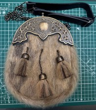 Scottish sporran in great condition with leather straps.