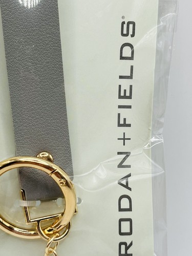 Rodan and Fields gray leatherette & gold metal signature R&F charm key chain - Picture 3 of 3