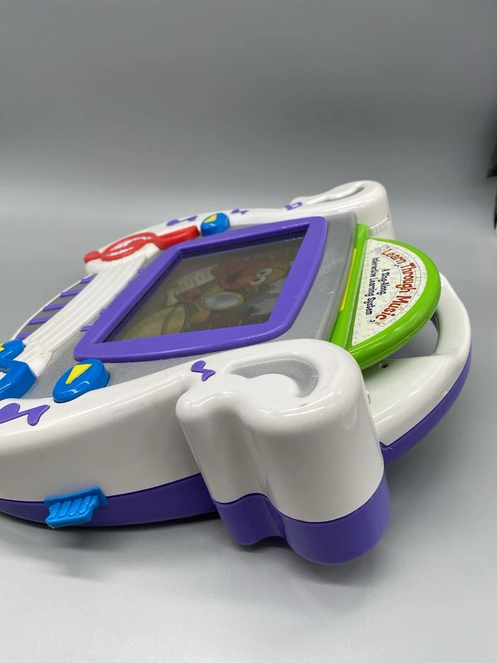 Sistema de aprendizaje interactivo Mattel Learn Through Music 2002 con Elmo - NECESITA TLC Foto 4 de 4