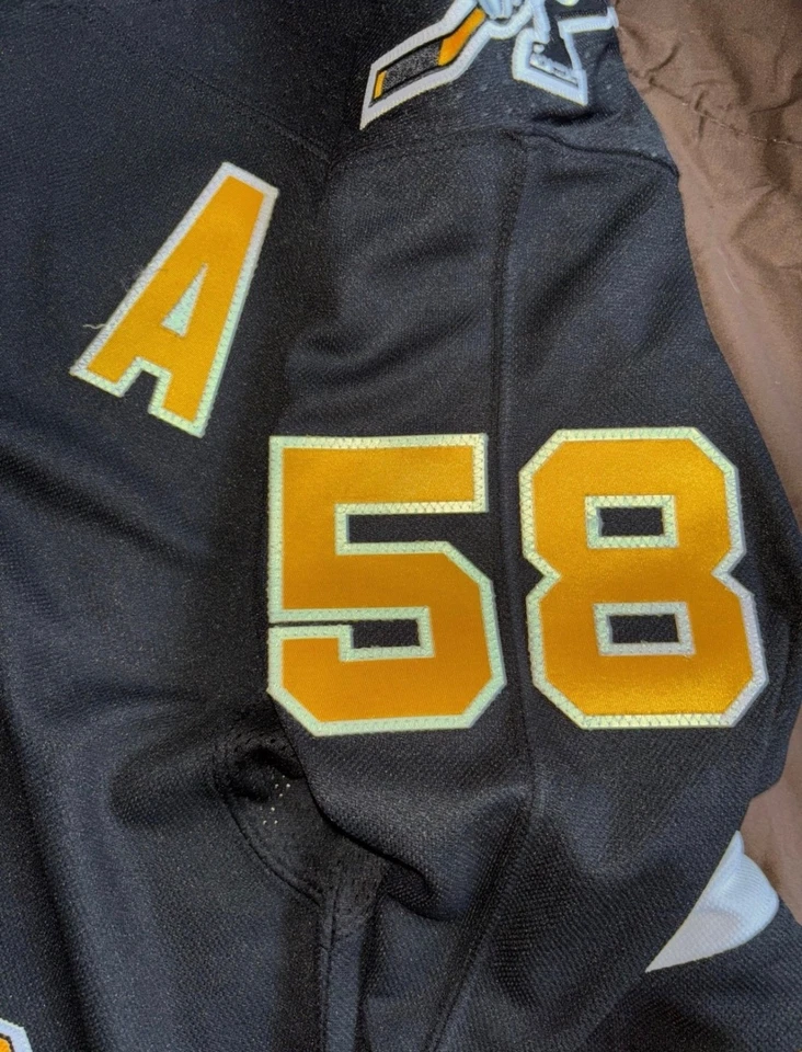 Camiseta deportiva de hockey para hombre Adidas NHL Pittsburgh Penguins Kris Letang grande Foto 3 de 4