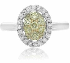 ESTATE .64CT WHITE  FANCY YELLOW DIAMOND 14KT TWO TONE GOLD OVAL CLUSTER RING