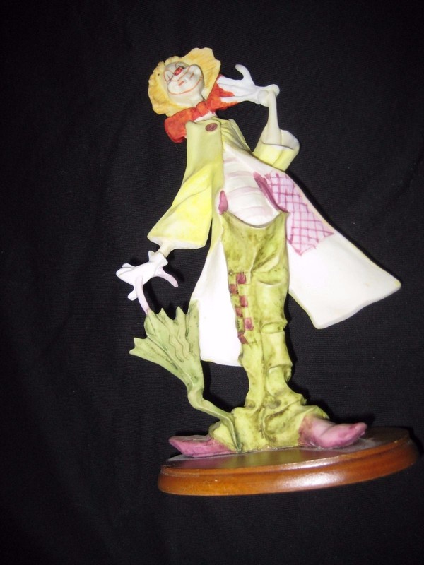 CLOWN WITH UMBRELLA ON WOODEN BASE  7.5" TALL 