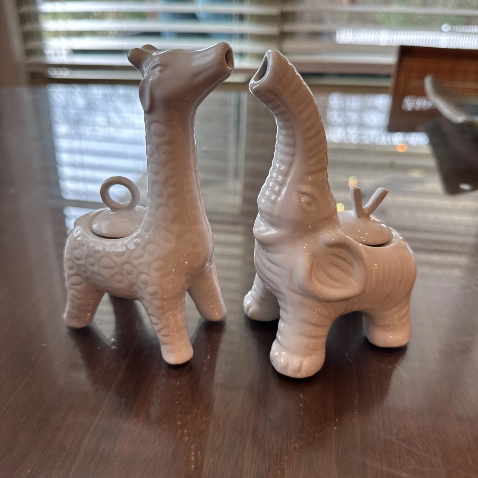 Pottery Barn elephant and giraffe set oil vinegar