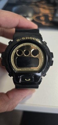G-SHOCK Black and Gold Digital Watch men s