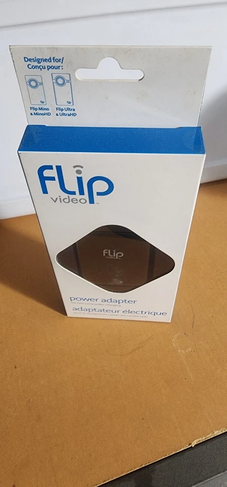 Nuevo adaptador de corriente Flip Video APA1B para carga rápida de videocámara Foto 2 de 4