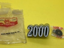 Toyota 1970's Grill Emblem Badge "2000" Nameplate 75321-95558 Genuine NOS