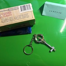 Blue Prince PRISM KEY Keychain from iam8bit - opened blind box