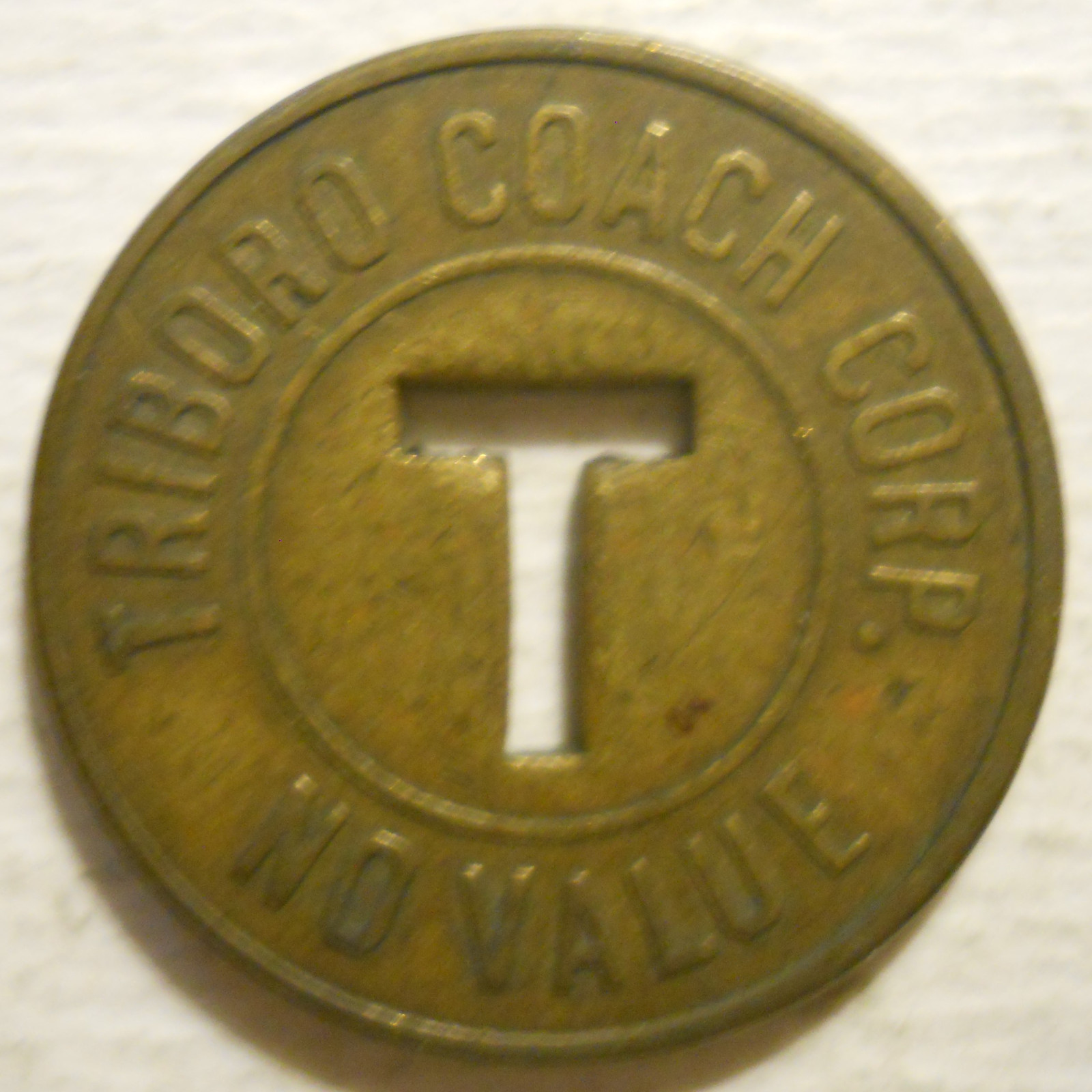 Triboro Coach Corp. (Queens, New York) transit token NY631L
