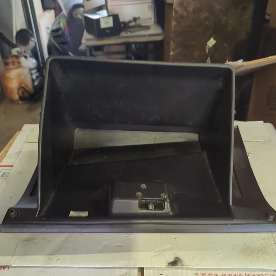 04-11 MAZDA RX8 GUANTERA COMPARTIMENTO DE ALMACENAMIENTO MONTAJE NEGRO OEM Foto 2 de 3