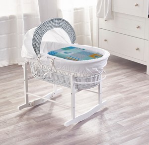 white wicker moses basket and stand