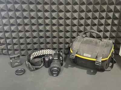 Nikon D3000 DSLR Camera Bundle w/ 55-200mm Lens, Battery, Charger, Bag, 32GB SD