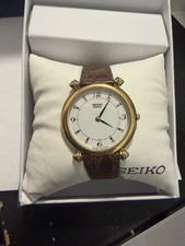 Seiko Quartz Vintage Mens White Dial Brown Leather Band Wristwatch