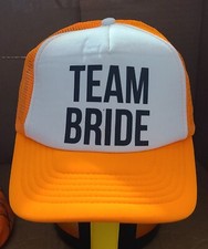 team bride orange  white trucker hat with black lettering