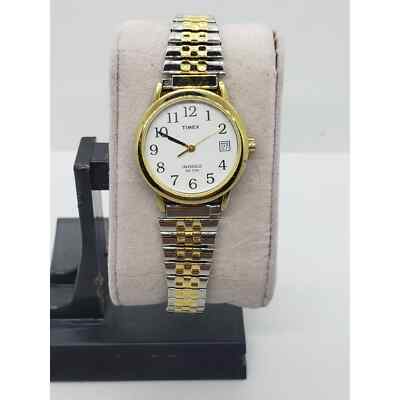 Women's Timex Indiglo watch. Gold bevel Calendar on watch
