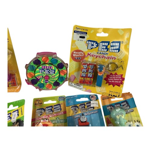 Lot X 19 PEZ Dispensers NEW on Cards Smurfs, Lion King, Peter Pez, Pez Keychain. - Picture 8 of 8