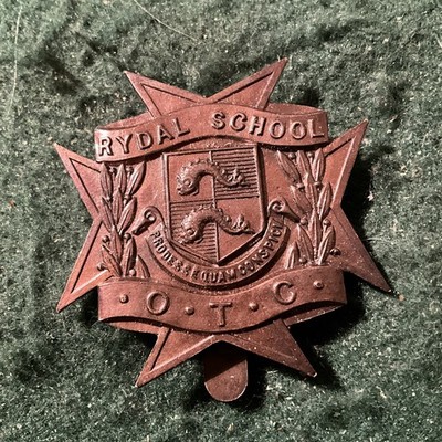 The Rydal School Officers Training Coll.  cap badge.    BRONZE.  WOODWARD.  EA26