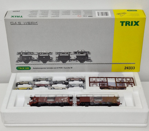 TRIX  H0 24333 Autotransporter beladen mit 8 PKW/ Epoche IV , Das Werk mit OVP | Zustand: Gebraucht