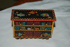 Beautiful colorfully painted miniature chest of drawers signed by artist