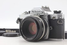 Lire[Exc+5] Appareil photo argentique Nikon FM SLR 35mm 50mm f/1.8 Ai Lens...
