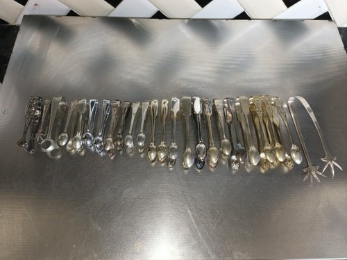RESTPOSTEN 24 ANTIKE SILBER TELLERZANGEN, u.a. KRALLENZANGE SELTENE EIERZANGEN