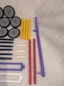 Assorted KNEX K&rsquo;nex Pieces Lot Of 65 Connectors / Rods / Wheels / Tires STEM