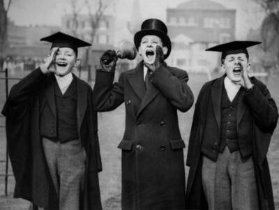 Three schoolchildren from Westmister School support their team- 1932 Old Photo