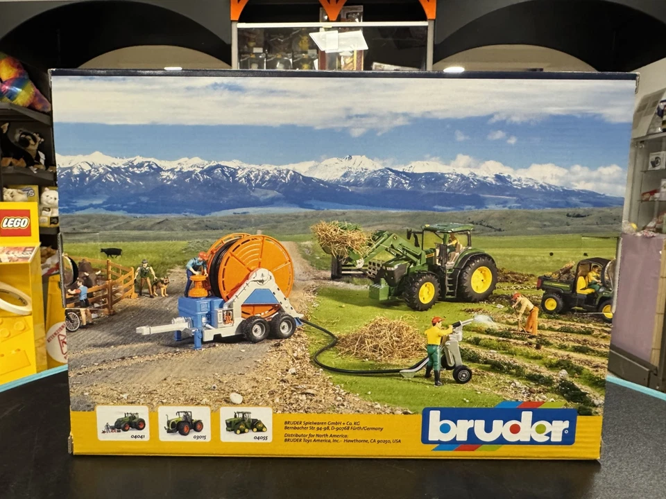 BRUDER 02034 - scala 1:16 - RIMORCHIO CON RUOTA DA IRRIGAZIONE - NUOVO - Immagine 3 di 4