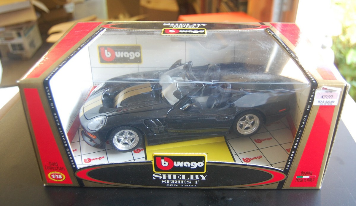 Bburago 1999 Shelby Series 1 Diecast Car Silver 1/18 Gold