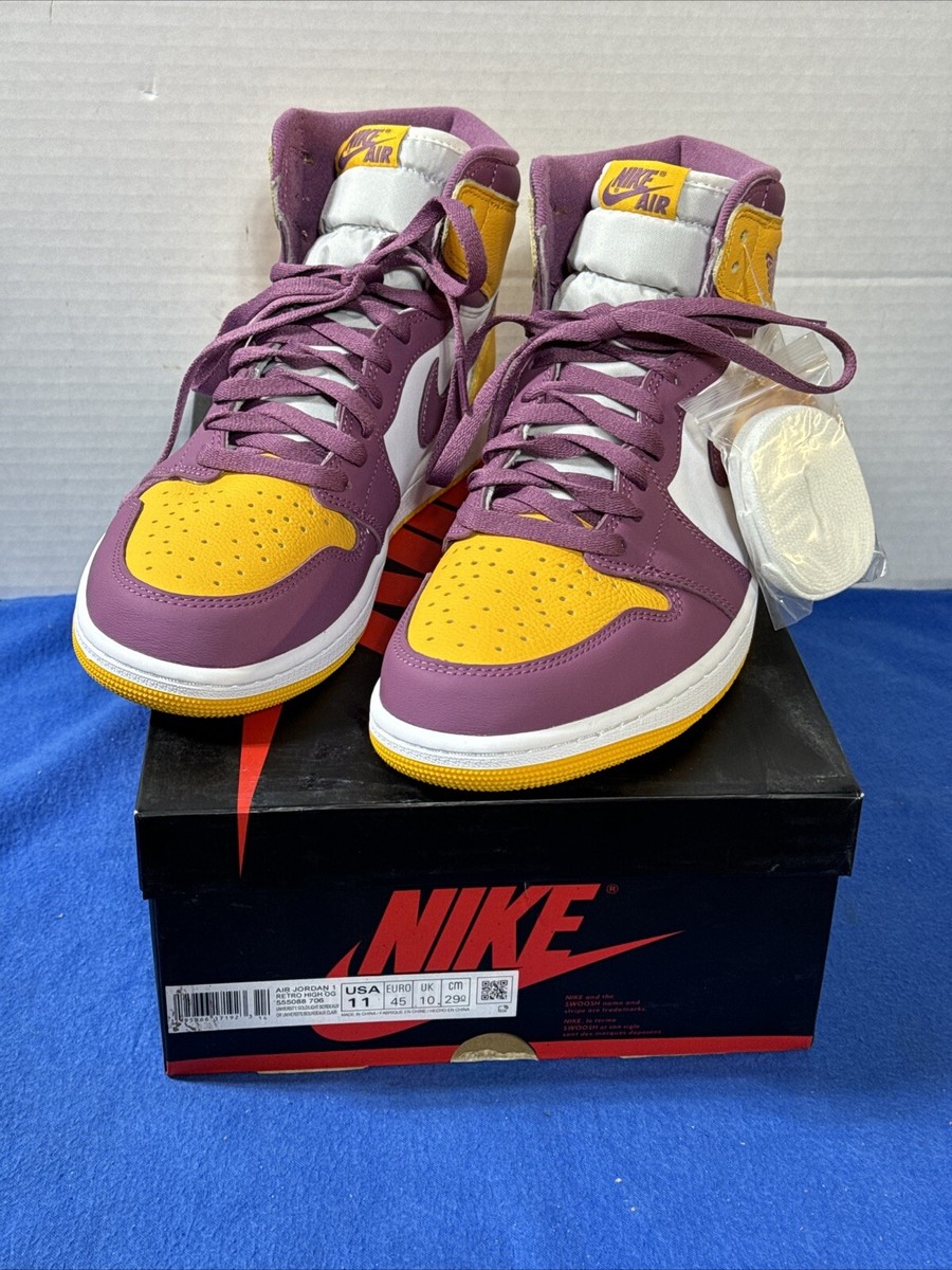 yellow and purple jordan 11