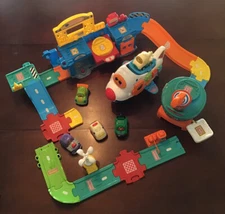 V Tech Lift And Repair Shop PLUS Airport & Plane Sets 3 Play Sets In The Bundle