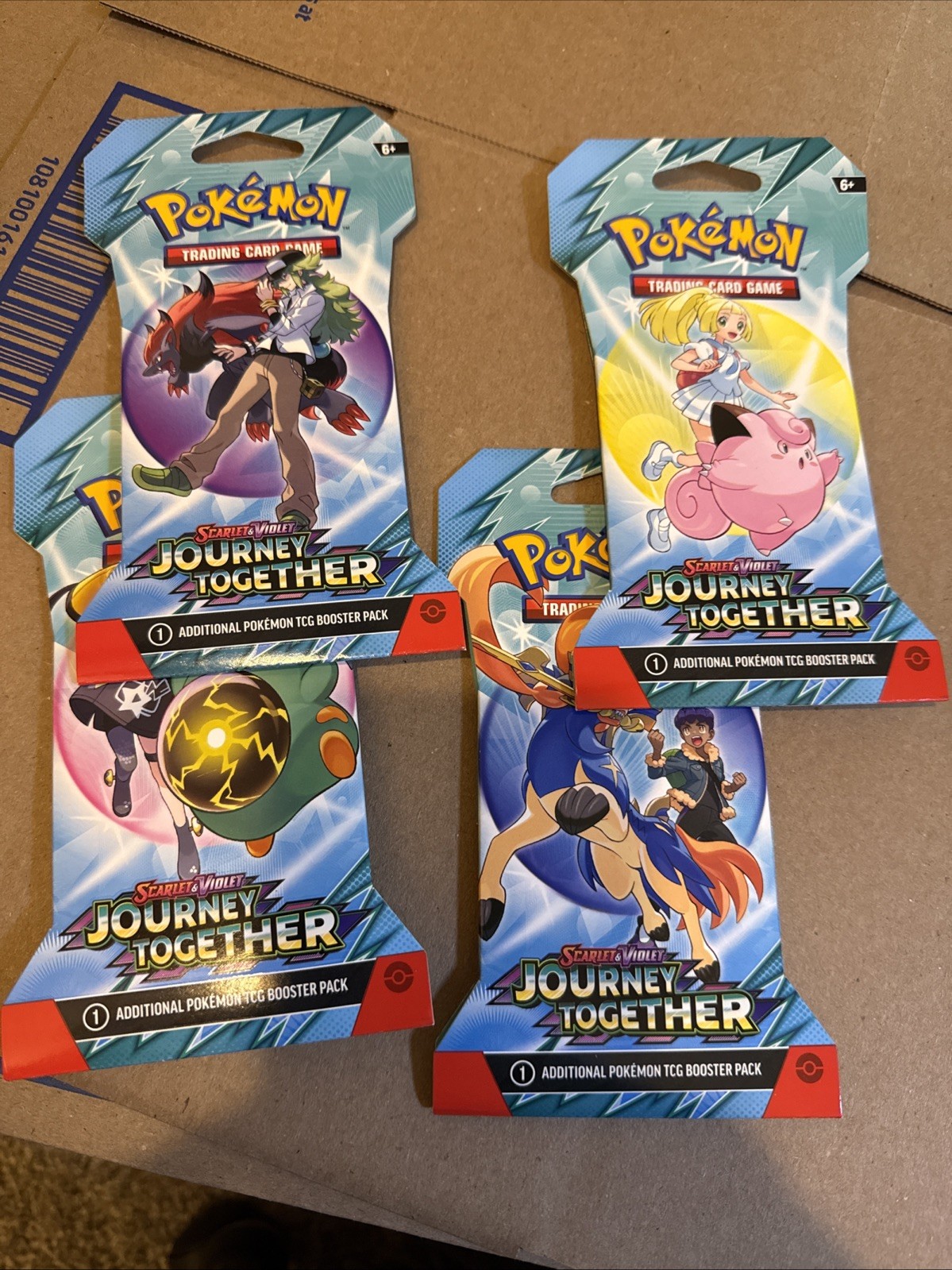 Pokémon Scarlet and Violet Journey Together Hanger Sealed booster pack Lot Of 4
