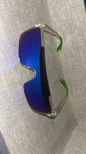 Purple and green sunglasses with a retro vibe festival rave goggles
