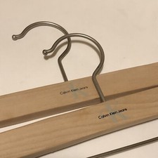 Calvin Klein Jeans Designer Logo Wood Hangers SetOf2 Metal Clips NEW Old Stock