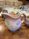 This is a vintage Hull Pottery creamer/pitcher (small pouring vessel)
