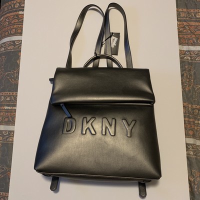 leather backpack rain