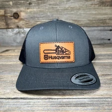 HUSQVARNA CHAINSAW LEATHER PATCH TRUCKER HAT