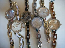 Women’s silver, gold, white, tortoise shell bracelet fashion watch