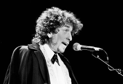 Bob Dylan speaks onstage during his induction at the Rock Roll Hal- Old Photo
